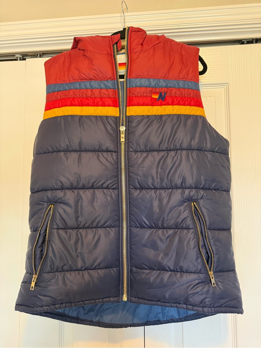 Aviator Nation Navy Blue Puffer Vest with Red & Yellow Stripes